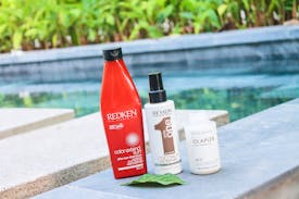 Sådan undgår du tørt og skadet hår i solen